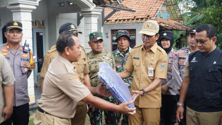 BANTUAN WARGA TERDAMPAK PUTING BELIUNG