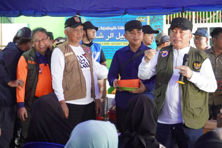 PENYERAHAN BANTUAN KORBAN TERDAMPAK BANJIR