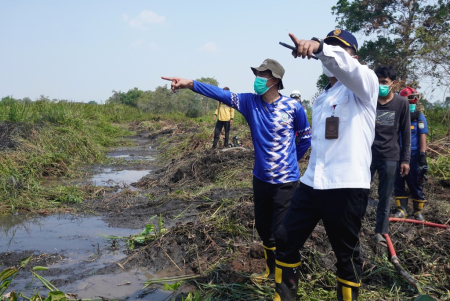 PENINJAUAN PENANGANAN KARHUTLA
