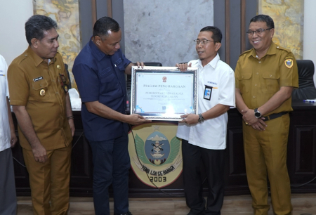 PENGHARGAAN DANA TRANSFER KE DAERAH