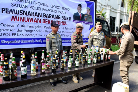 PEMUSNAHAN MINUMAN KERAS