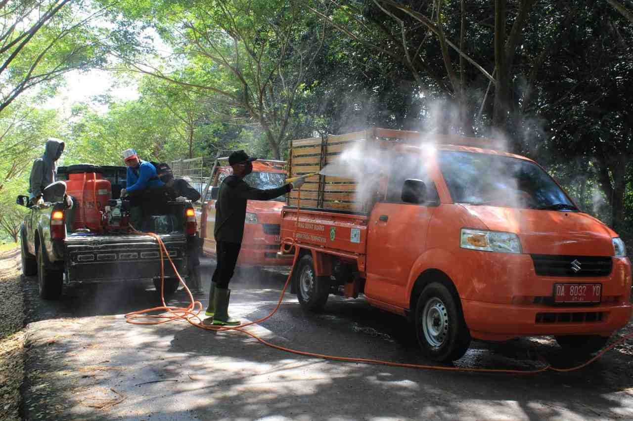 PENYEMPROTAN DISINFEKTAN DI TPA 