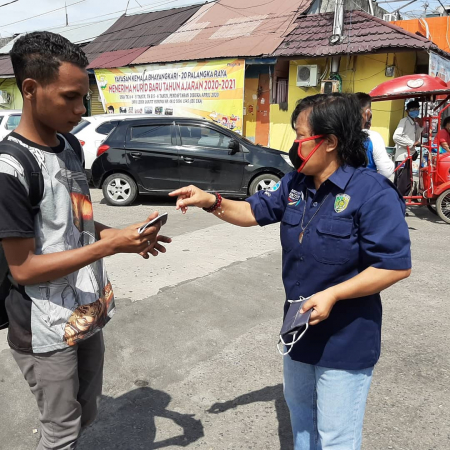 MENGIMBAU MENGGUNAKvAN MASKER