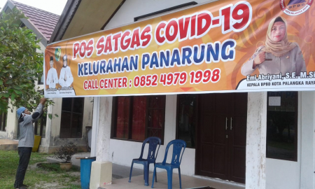 PASANG SPANDUK POS SATGAS COVID-19