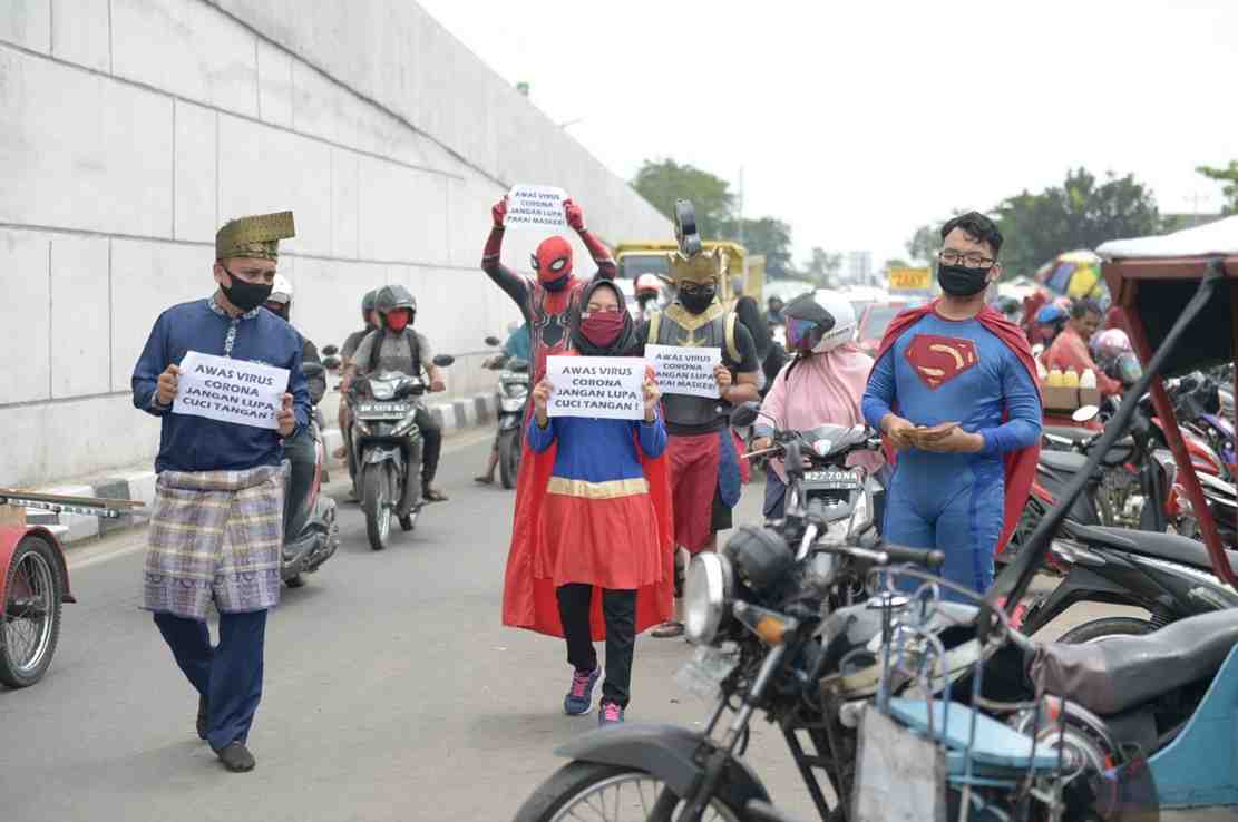 SUPERHERO SOSIALISASI BAHAYA COVID 19 