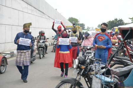 SUPERHERO SOSIALISASI BAHAYA COVID 19 