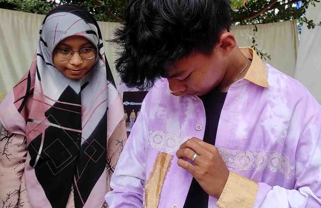 MELIHAT MOTIF KARAWO