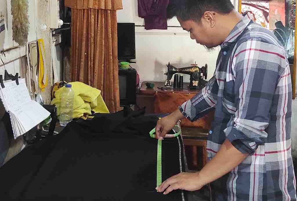 MENGUKUR KAIN