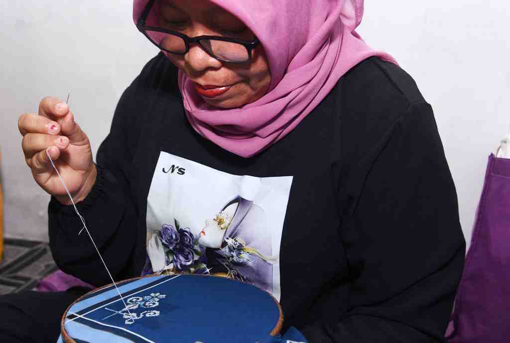 MENYULAM SAPUTANGAN