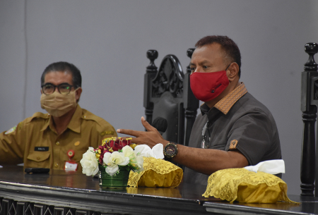 RAPAT EVALUASI PERCEPATAN PENANGANAN COVID-19