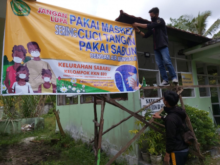 MAHASISWA KKN SOSIALISASI COVID-19