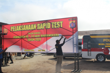 MEMASANG SPANDUK RAPID TEST