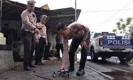 PULUHAN PELANGGAR TERPOTRET ETLE DRONE