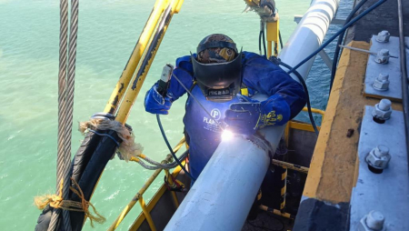 PENGERJAAN INTERKONEKSI LISTRIK JAWA-MADURA