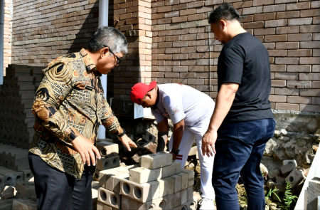 PRODUKSI BATA INTERLOCK