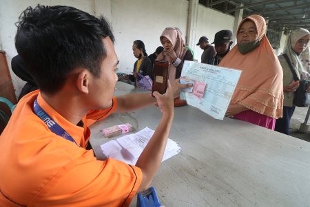 PENCAIRAN BPNT DAN PKH DI KOTA KEDIRI