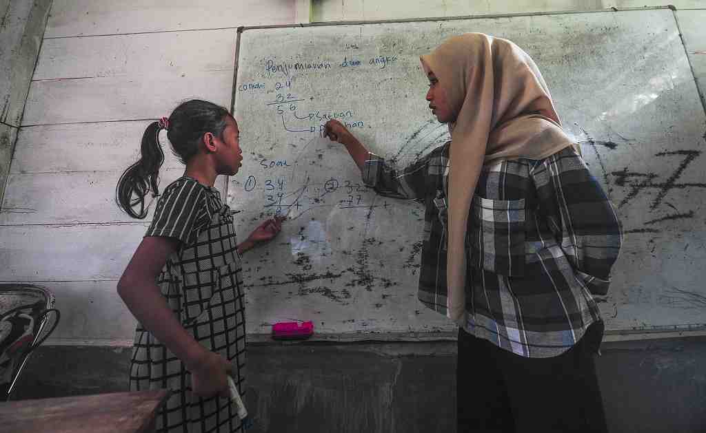 PENDIDIKAN ANAK SUKU BATIN SEMBILAN
