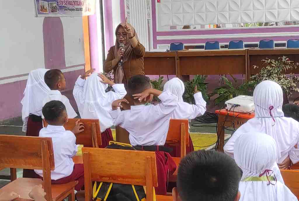 INTERAKSI GURU