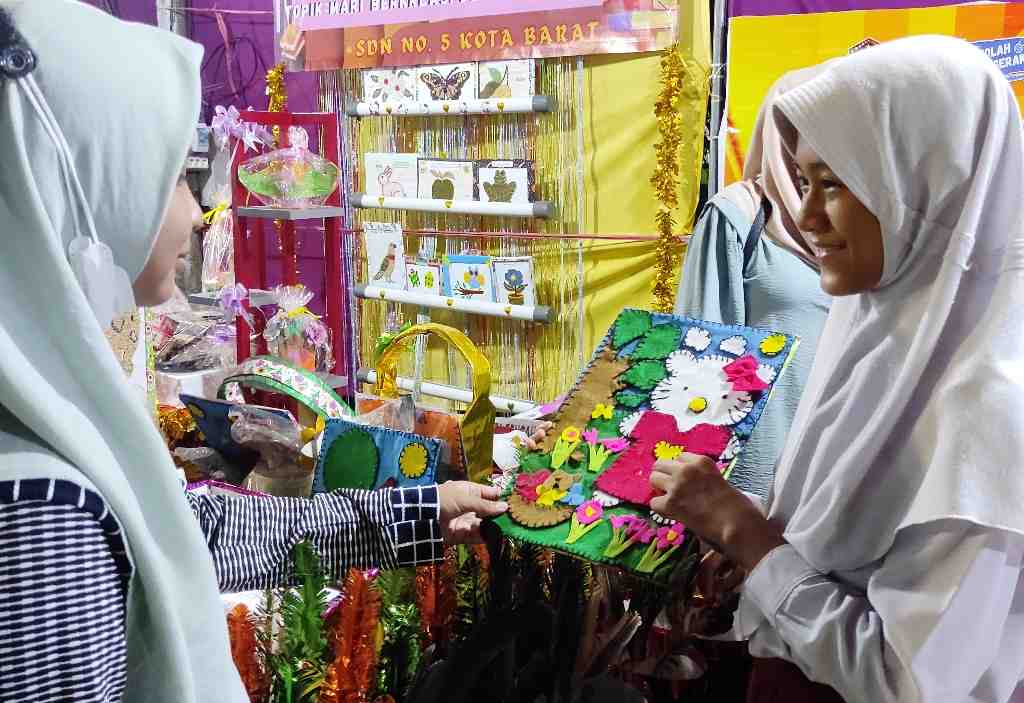 LUKISAN KAIN BEKAS