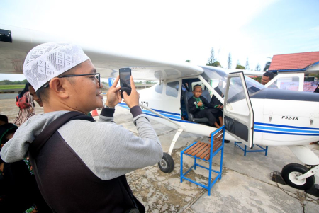 POTRET DUDUK DI PESAWAT