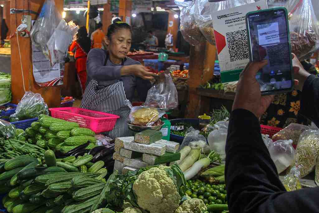 PEMBAYARAN MELALUI QRIS DI PASAR RAKYAT PEKANBARU