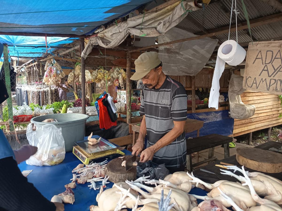 PEDAGANG AYAM POTONG
