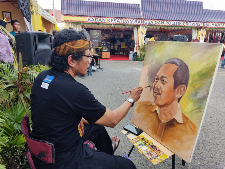 MELUKIS WAJAH SEORANG PEJABAT