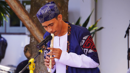 MENIUP SULING