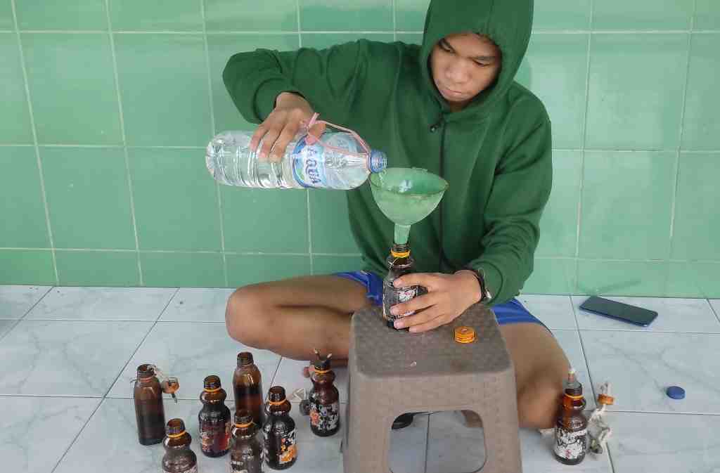 MENGISI LAMPU BOTOL