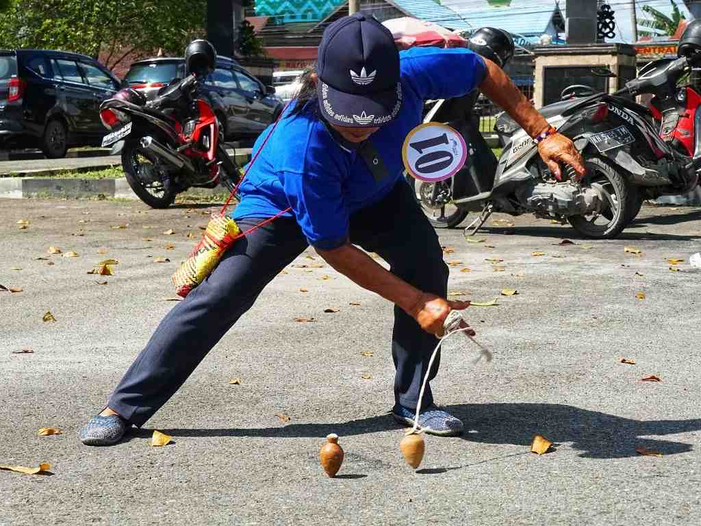 MELEMPAR GASING 