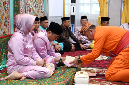 UPACARA ADAT MOPOTOLUNGO