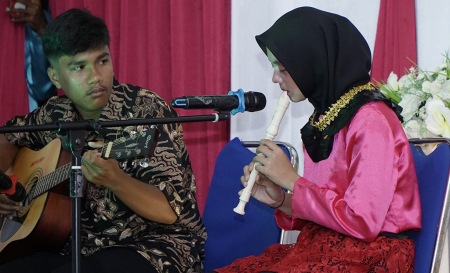 MENIUP SULING