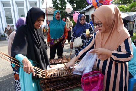 PENJUAL IKAN SAGELA